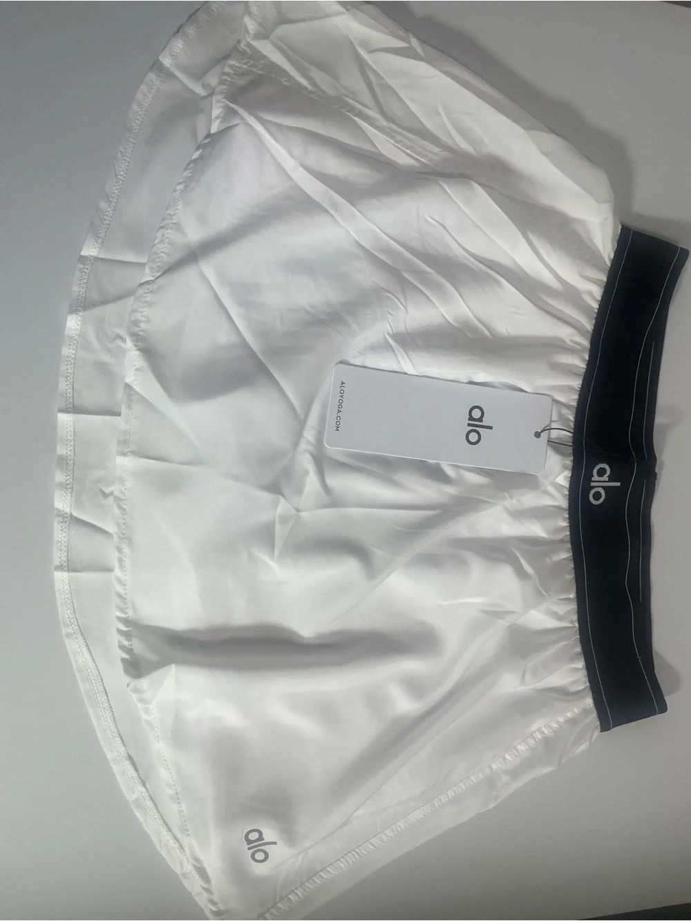 ALO Yoga White Skirt with Black Elastic Waistband